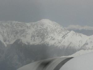 Flight over snowy mountains in Albania